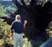 Aboriginal elder Uncle Max, teaching at the old chestnut tree at Kodoji during Walking the Country retreat